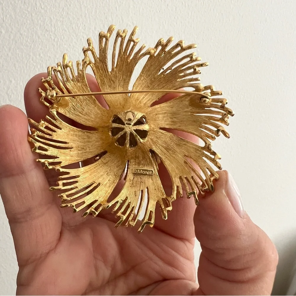 Vintage Monet pin from 1960’s with some patina on the metal - lovely for…